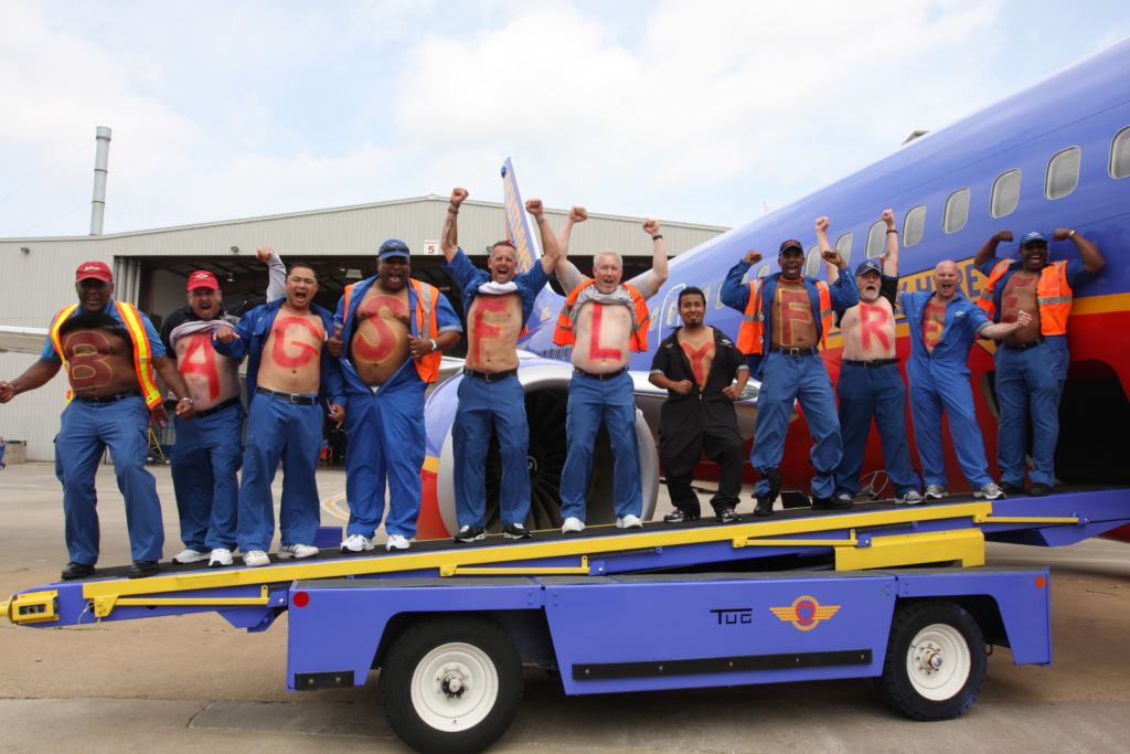 Yes, Southwest employees really painted their chests to promote that bags fly free on Southwest Airlines.